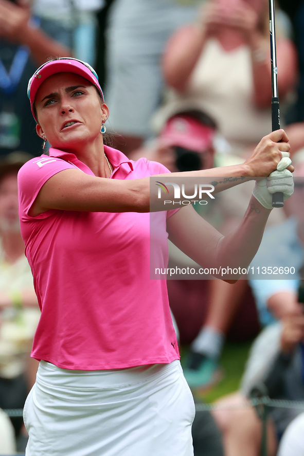 Lexi Thompson of Florida hits from the 17th tee during the third round of the KPMG Women's PGA Championship at Sahalee Country Club on Satur...