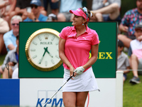 Lexi Thompson of Florida reacts to her shot from the 17th tee during the third round of the KPMG Women's PGA Championship at Sahalee Country...