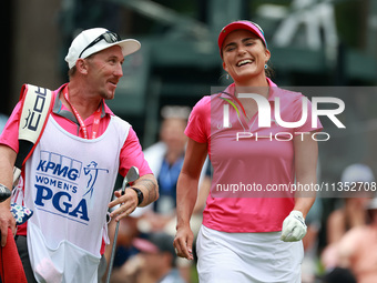 Lexi Thompson of Florida reacts to her shot from the 17th tee during the third round of the KPMG Women's PGA Championship at Sahalee Country...