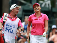 Lexi Thompson of Florida reacts to her shot from the 17th tee during the third round of the KPMG Women's PGA Championship at Sahalee Country...