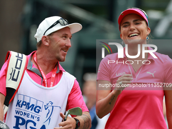 Lexi Thompson of Florida reacts to her shot from the 17th tee during the third round of the KPMG Women's PGA Championship at Sahalee Country...