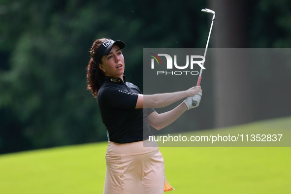 Georgia Hall of England plays her shot toward the 10th green during Day Three of the KPMG Women's PGA Championship at Sahalee Country Club i...