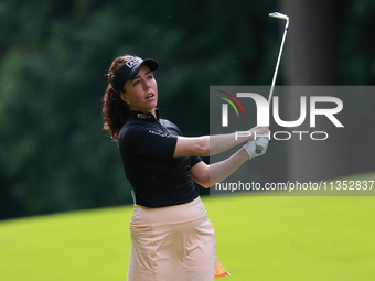 Georgia Hall of England plays her shot toward the 10th green during Day Three of the KPMG Women's PGA Championship at Sahalee Country Club i...