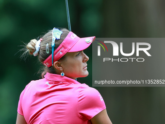 Lexi Thompson of Florida follows her shot from the 18th fairway during the third round of the KPMG Women's PGA Championship at Sahalee Count...