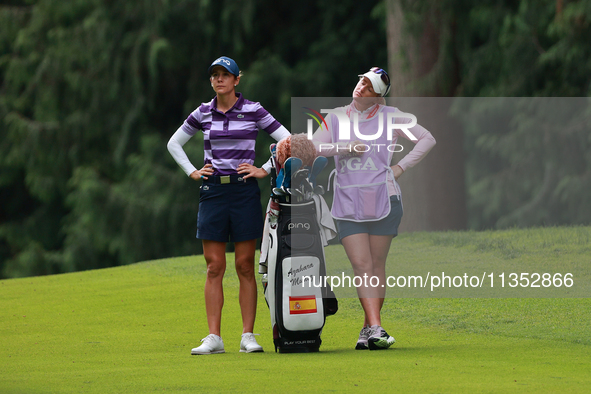 Azahara Munoz of Spain waits on the 10th hole during Day Three of the KPMG Women's PGA Championship at Sahalee Country Club in Sammamish, Wa...