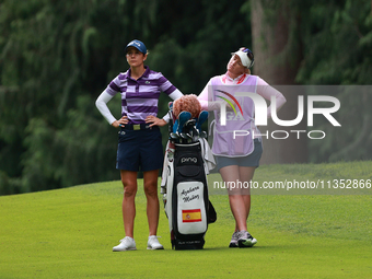 Azahara Munoz of Spain waits on the 10th hole during Day Three of the KPMG Women's PGA Championship at Sahalee Country Club in Sammamish, Wa...