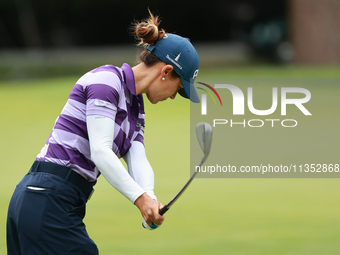 Azahara Munoz of Spain plays her shot toward the 10th green during Day Three of the KPMG Women's PGA Championship at Sahalee Country Club in...