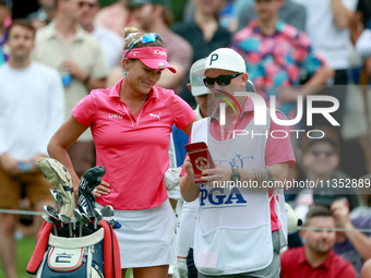 Lexi Thompson of Florida waits with her caddie at the 17th tee during the third round of the KPMG Women's PGA Championship at Sahalee Countr...