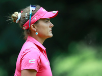 Lexi Thompson of Florida walks to the 16th green during the third round of the KPMG Women's PGA Championship at Sahalee Country Club on Satu...