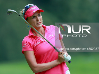 Lexi Thompson of Florida follows her shot to the 15th green during the third round of the KPMG Women's PGA Championship at Sahalee Country C...