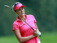 Lexi Thompson of Florida follows her shot to the 15th green during the third round of the KPMG Women's PGA Championship at Sahalee Country C...