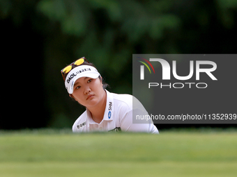 Haeran Ryu of Republic of Korea prepares to hit her shot to the 15th green during the third round of the KPMG Women's PGA Championship at Sa...