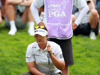 Haeran Ryu of Republic of Korea lines up her putt with her caddie on the 16th green during the third round of the KPMG Women's PGA Champions...