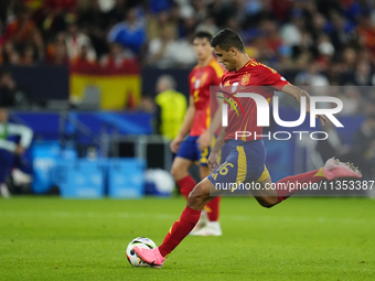 Rodrigo Hernandez defensive midfield of Spain and Manchester City during the UEFA EURO 2024 group stage match between Spain and Italy at Are...