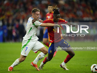 Davide Frattesi central midfield of Italy and Inter Milan and Nico Williams left winger of Spain and Athletic Club Bilbao compete for the ba...