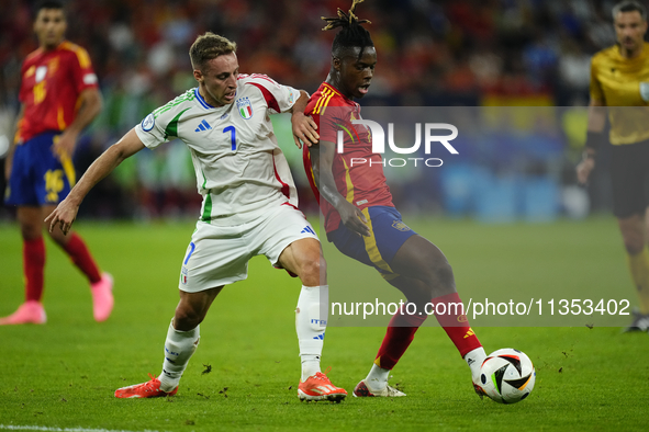 Davide Frattesi central midfield of Italy and Inter Milan and Nico Williams left winger of Spain and Athletic Club Bilbao compete for the ba...