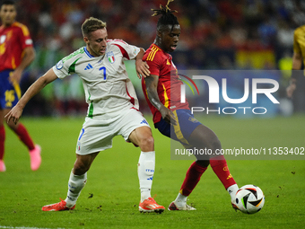 Davide Frattesi central midfield of Italy and Inter Milan and Nico Williams left winger of Spain and Athletic Club Bilbao compete for the ba...