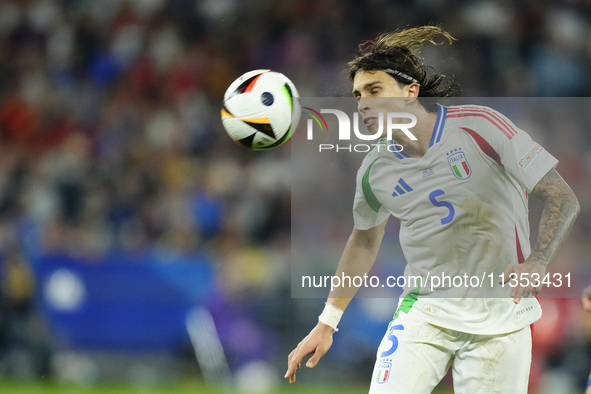 Riccardo Calafiori centre-back of Italy and Bologna FC 1909 during the UEFA EURO 2024 group stage match between Spain and Italy at Arena Auf...