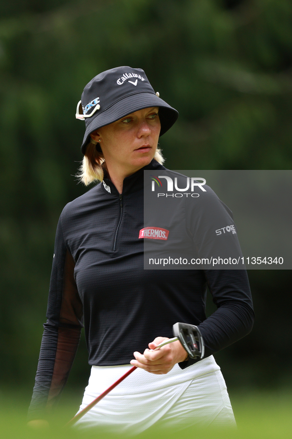 Madelene Sagstrom of Sweden lines up her putt on the 8th green during Day Three of the KPMG Women's PGA Championship at Sahalee Country Club...