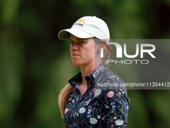 Sarah Schmelzel of Arizona waits on the 14th green during the third round of the KPMG Women's PGA Championship at Sahalee Country Club on Sa...