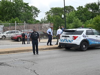 Two people are being found dead inside a vehicle with multiple gunshot wounds throughout the body in Chicago, Illinois, United States, on Ju...