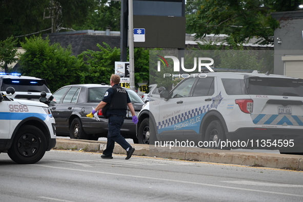 Two people are being found dead inside a vehicle with multiple gunshot wounds throughout the body in Chicago, Illinois, United States, on Ju...