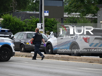 Two people are being found dead inside a vehicle with multiple gunshot wounds throughout the body in Chicago, Illinois, United States, on Ju...