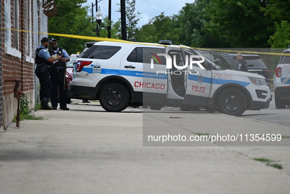 Two people are being found dead inside a vehicle with multiple gunshot wounds throughout the body in Chicago, Illinois, United States, on Ju...