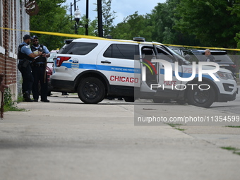 Two people are being found dead inside a vehicle with multiple gunshot wounds throughout the body in Chicago, Illinois, United States, on Ju...