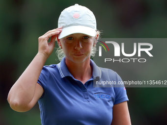 Lauren Hartlage of Kentucky walks on the 14th green during the third round of the KPMG Women's PGA Championship at Sahalee Country Club on S...