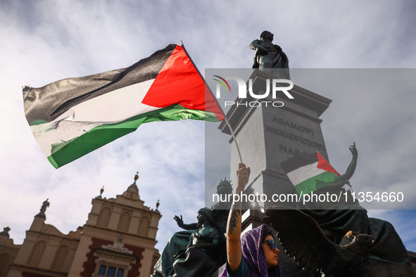 Palestinian flags are seen during a solidarity with Palestine demonstration at the Main Square in Krakow, Poland on June 20th, 2024. 