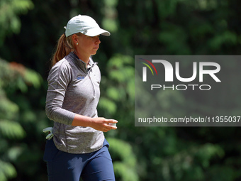 Lauren Hartlage of Kentucky walks on the 3rd green during the final round of the KPMG Women's PGA Championship at Sahalee Country Club on Su...