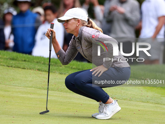 Lauren Hartlage of Kentucky lines up her putt on the 3rd green during the final round of the KPMG Women's PGA Championship at Sahalee Countr...