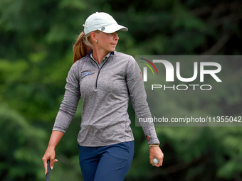 Lauren Hartlage of Kentucky walks on the 3rd green during the final round of the KPMG Women's PGA Championship at Sahalee Country Club on Su...