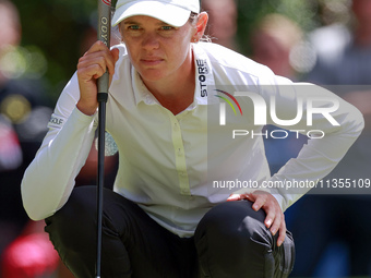 Sarah Schmelzel of Arizona lines up her putt on the 3rd green during the final round of the KPMG Women's PGA Championship at Sahalee Country...