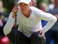 Sarah Schmelzel of Arizona lines up her putt on the 3rd green during the final round of the KPMG Women's PGA Championship at Sahalee Country...