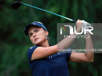 Lexi Thompson of Florida hits from the 4th tee during the final round of the KPMG Women's PGA Championship at Sahalee Country Club on Sunday...