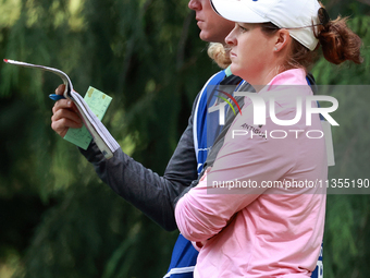 Ally Ewing of Mississippi waits at the 4th tee with her caddie during the final round of the KPMG Women's PGA Championship at Sahalee Countr...