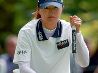 Jin Young Ko of Republic of Korea lines up her putt on the 3rd green during the final round of the KPMG Women's PGA Championship at Sahalee...