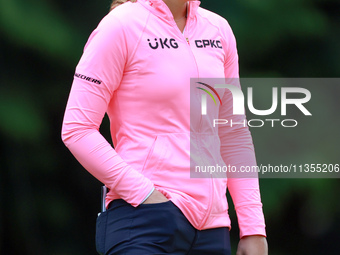 Brooke M. Henderson of Canada waits on the 4th green during the final round of the KPMG Women's PGA Championship at Sahalee Country Club on...