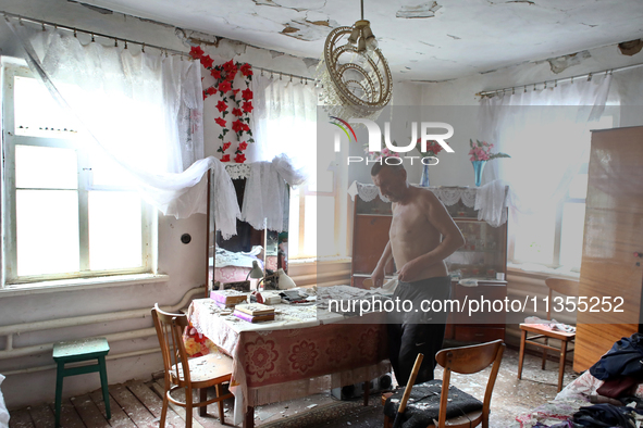 A man is being seen in a house damaged by a Russian missile attack in Vasylkiv, Ukraine, on June 23, 2024. On Sunday morning, June 23, anti-...