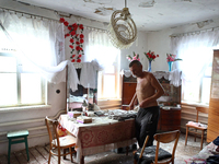 A man is being seen in a house damaged by a Russian missile attack in Vasylkiv, Ukraine, on June 23, 2024. On Sunday morning, June 23, anti-...