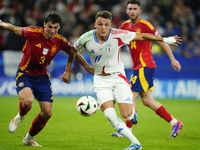 Robin Le Normand centre-back of Spain and Real Sociedad and Mateo Retegui centre-forward of Italy and Genoa CFC compete for the ball during...