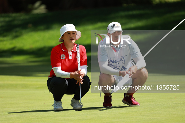 Amy Yang of Republic of Korea lines up her putt on the second green during Day Four of the KPMG Women's PGA Championship at Sahalee Country...