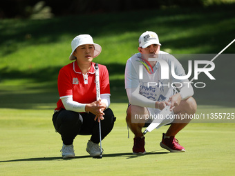 Amy Yang of Republic of Korea lines up her putt on the second green during Day Four of the KPMG Women's PGA Championship at Sahalee Country...