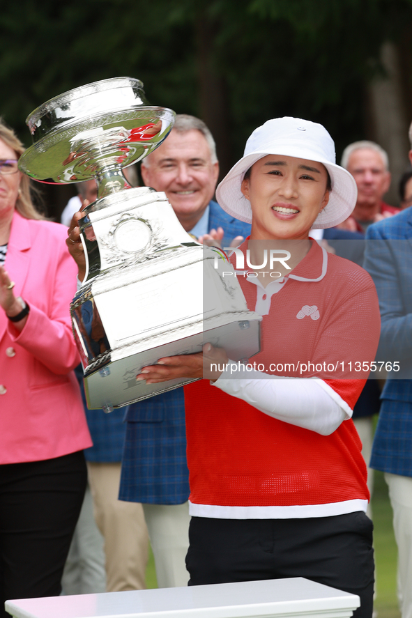 Amy Yang of Republic of Korea holds up the trophy after winning the KPMG Women's PGA Championship at Sahalee Country Club in Sammamish, Wash...