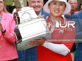 Amy Yang of Republic of Korea holds up the trophy after winning the KPMG Women's PGA Championship at Sahalee Country Club in Sammamish, Wash...