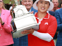 Amy Yang of Republic of Korea holds up the trophy after winning the KPMG Women's PGA Championship at Sahalee Country Club in Sammamish, Wash...