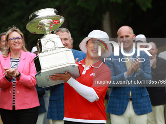 Amy Yang of Republic of Korea holds up the trophy after winning the KPMG Women's PGA Championship at Sahalee Country Club in Sammamish, Wash...