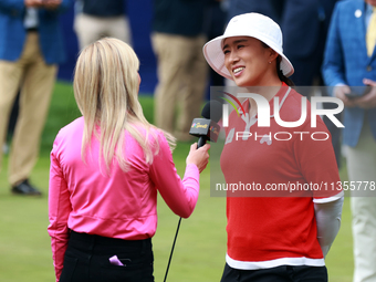 Amy Yang of Republic of Korea is interviewed during the awards ceremony after winning the KPMG Women's PGA Championship at Sahalee Country C...